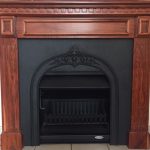Cast iron Fascia with Teak Wood Surround